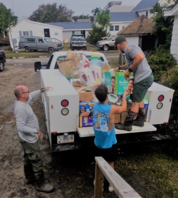 Shane Bryan and Corey Cutright deliver food, water, and other essentials to Ocracoke Island residents.
